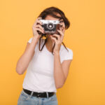 portrait young brunette woman making photo